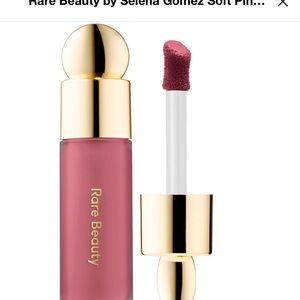 Rare Beauty Mauve Lip Gloss with Gold Accents in Believe